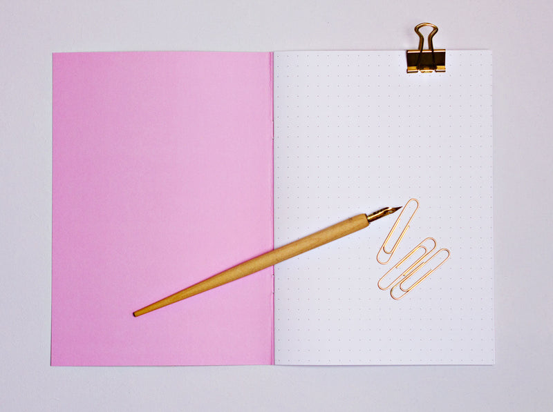 The Completist pink animal print notebook