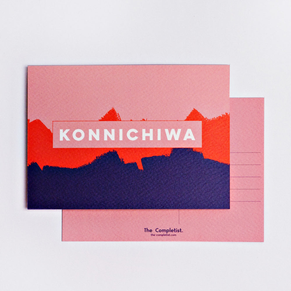 The Completist pink blue konnichiwa brushstroke postcard