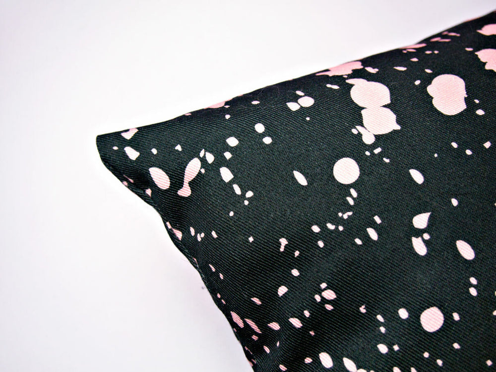 The Completist pink green speckle cushion cover